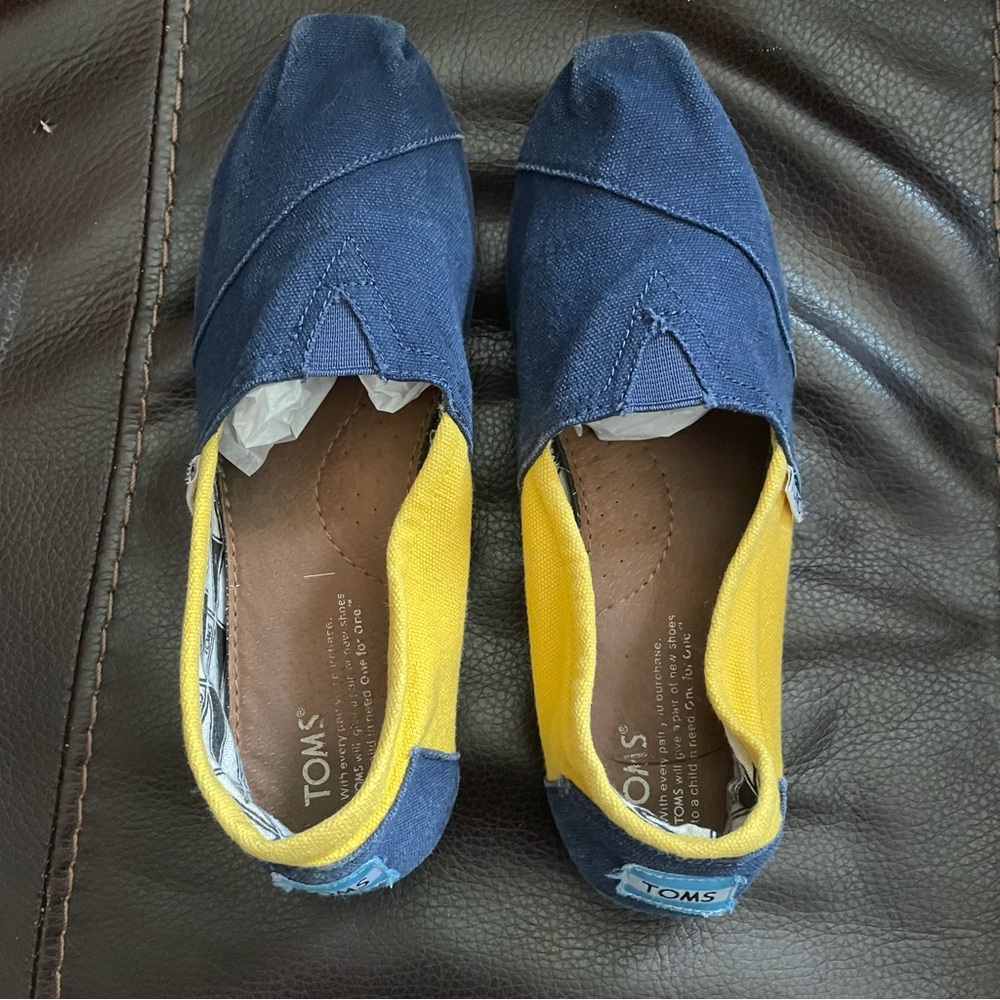 TOMS Navy and Yellow Canvas Slip-Ons